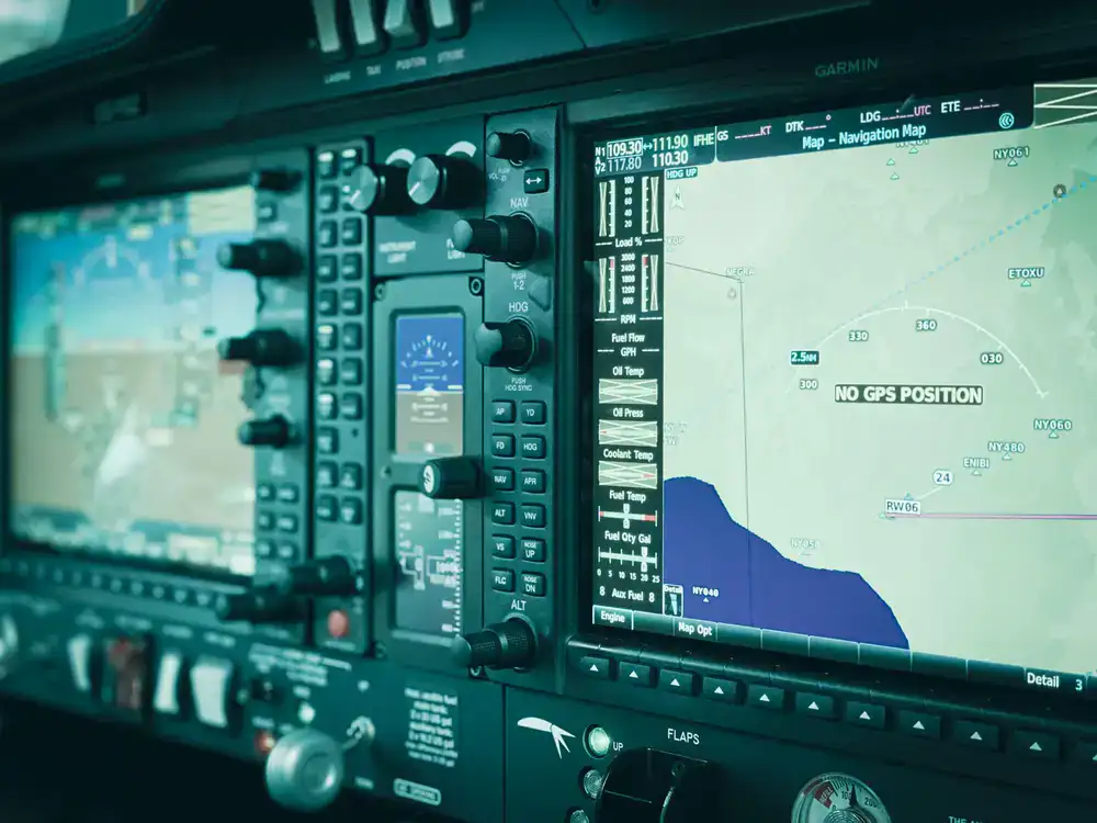Instructor pointing to an IFR flight chart during briefing