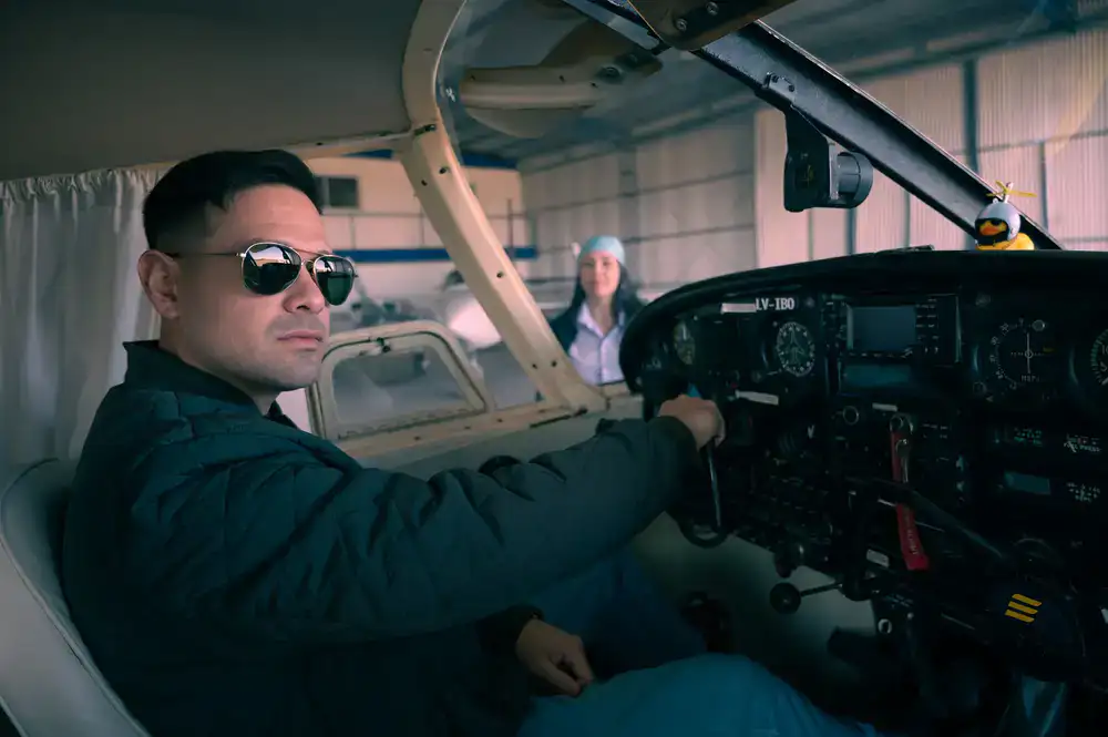Instructor reviewing flight telemetry with a student